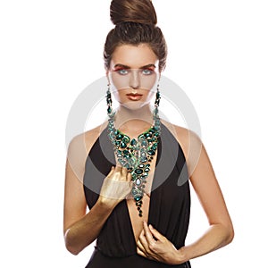 Sexy woman wearing big beautiful necklace with a lot of gems