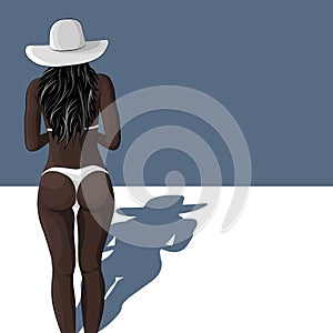 young african girl in swimsuit and sun hat