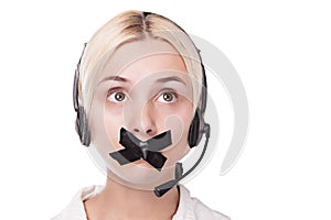 young blond woman in a headset looks up and can not speak,