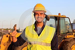 young construction worker giving a thumbs up