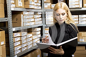young woman doing inventory photo