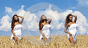 young woman in a wheat golden field