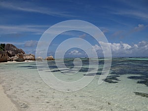 Seychelles la digue blue cristalline water and pink granit rock