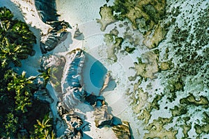 Seychelles, La Digue top down aerial view of tropical beach Anse Source D Argent