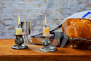 Shabbat or Sabbath kiddush ceremony composition with red kosher wine