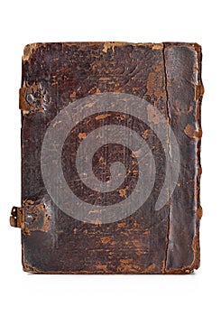 A shabby antique book with metal locks.