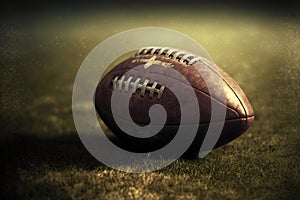 Shabby brown American football ball lying on grass, generative ai