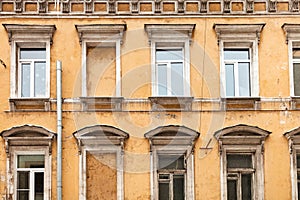 Shabby facade of old urban house in Moscow