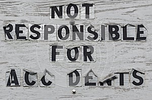 Shabby NOT RESPONSIBLE FOR ACCIDENTS sign