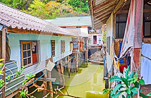 The shabby stilt huts, Ko Panyi floating village, Phang Nga Bay, Thailand