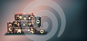 Shabby Vintage Ancient Suitcases on a dark background. Concept travel