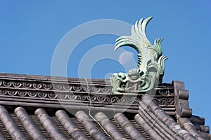 The shachi (kinshachi) on the top of Nagoya castle tower roof. Nagoya. Japan