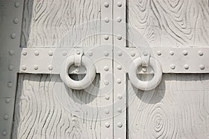 Shackled gates made of cement in a castle in a children`s park