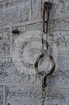 Shackles and a chain hanging