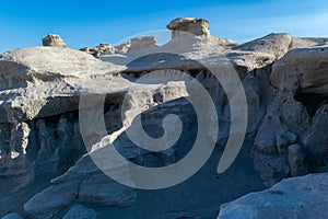 Shade and sunlight lend their creative touch to the Badlands formations