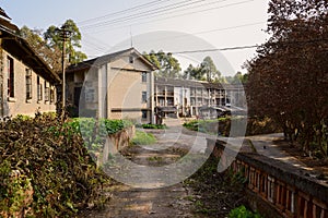 Shaded ramp before deserted buildings of 1970s