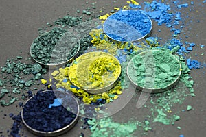 Shades of Blue and Green crushed Eyeshadow on a Black background