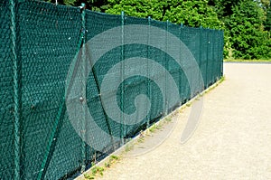 The shading fabric on the wire fence creates a private space and in a moment you have an opaque fence from annoying neighbors and