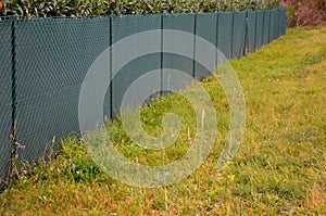 The shading fabric on the wire fence creates a private space and in a moment you have an opaque fence from annoying neighbors and