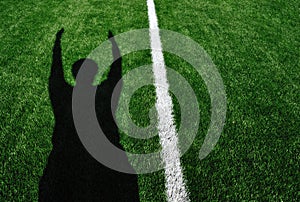 Shadow of American Football Referee Touchdown
