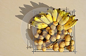 Shadow of bananas and longkong