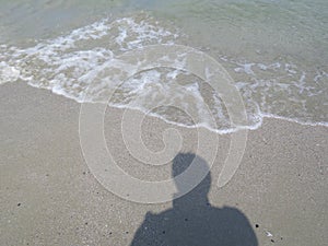 Shadow on the beach.