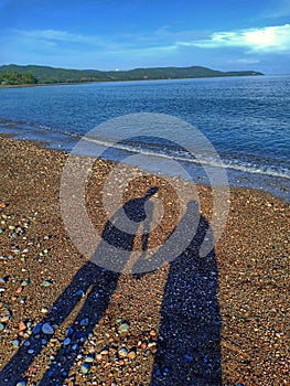 shadow by the beach pota with my wife photo