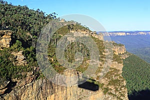 Shadow of a cable car on a cliff in the Blue Mountains, Australia