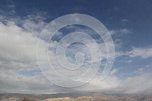 Shadow of clouds on the mountains and beautiful blue sky background