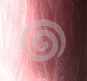 Shadow detail texture of red palm wax candle