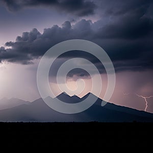 Is in shadow, emphasizing the contrast between the dark foreground