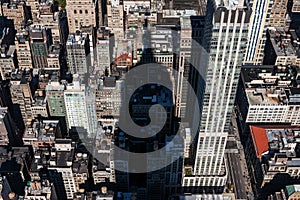 The shadow of Empire State Building on the blocks of Manhattan