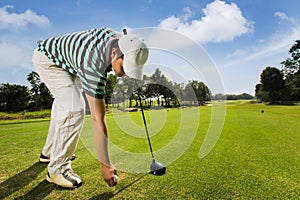 Shadow of golfer That is going to putt