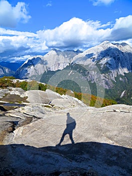 Shadow of a Lonely Hiker in the Mountains