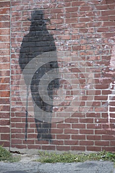 Shadow of a Man on brick Wall