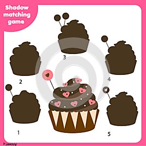 Shadow matching game. Kids activity with Valentine`s day cupcake