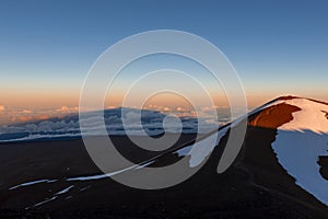 Shadow of Mauna Kea volcano cast at sunset