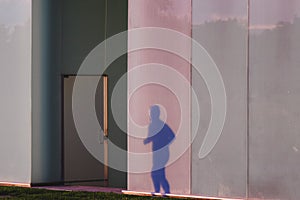 Shadow of people projected on the bus station of Pamplona, Spain