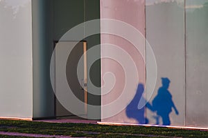 Shadow of people projected on the bus station of Pamplona, Spain