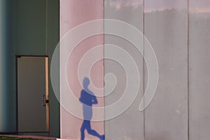 Shadow of people projected on the bus station of Pamplona, Spain