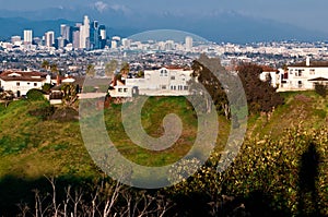 Shadow of person looking into th beautiful LA cityscape with mou