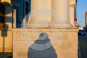 Shadow self portrait on the history building , natural light