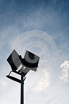 A shadow of spot light under the blue sky