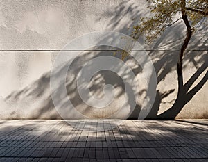 A shadow of swaying tree branches reflected on a weathered concrete wall emphasizing natural harmony