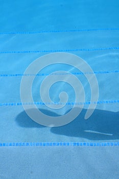 Shadow on a swimming pool