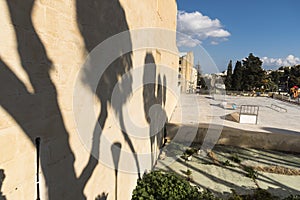 Shadowed wall and playground Victoria Gozo