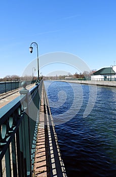 Shadows along the Owasco Lake canal pier walkway