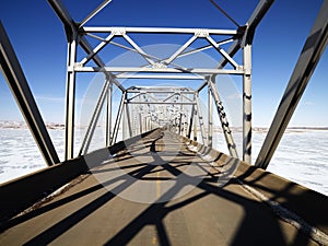 Shadows on bridge.