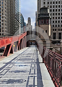 Shadows of the fence design on the LaSalle Street bridge over the Chicago River