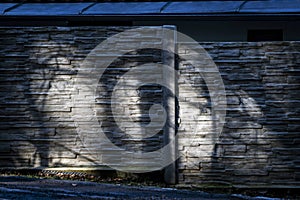 Shadows and lights on stone wall